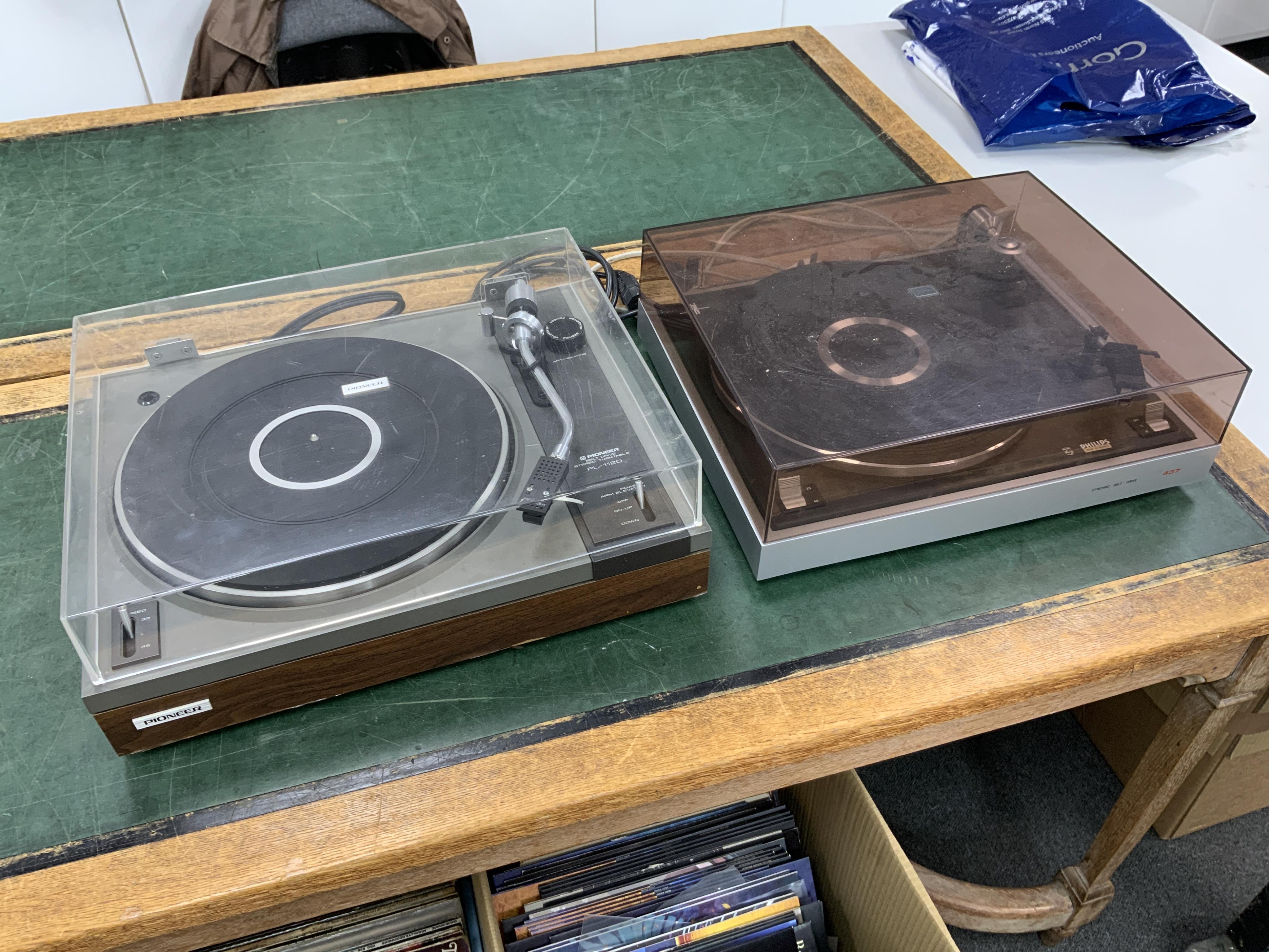 Two record players; a Philips 437 turntable together with a Pioneer PL-112D turntable, both with leads. Condition - fair to good